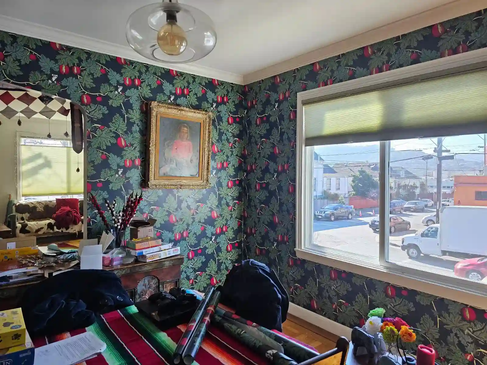 Professional wallpaper installer applying wallcovering