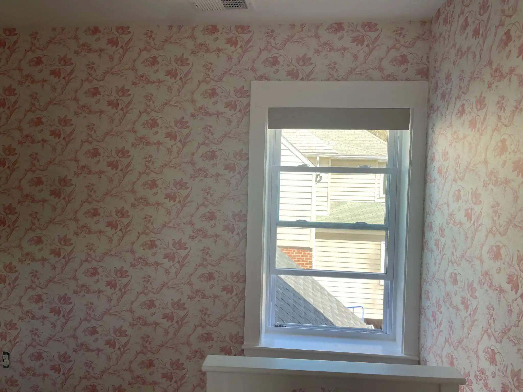 Detailed wallpaper craftsmanship and pattern matching